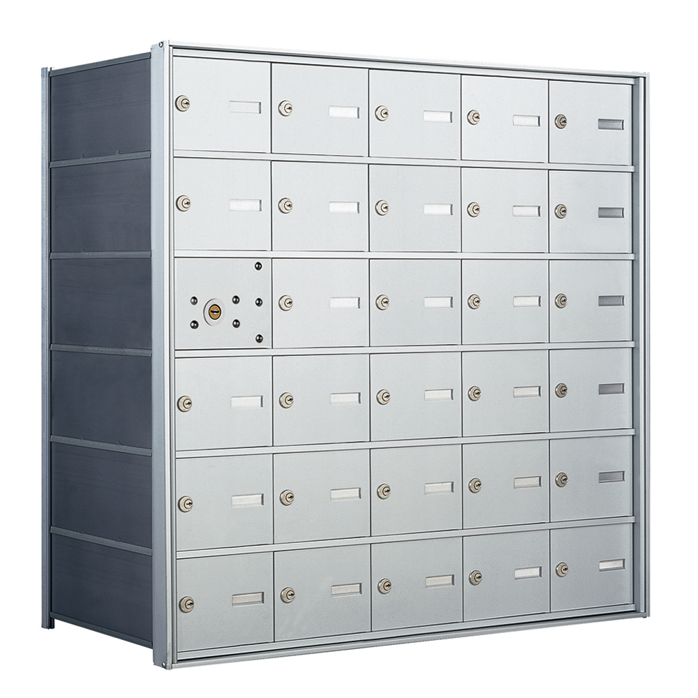 Silver metal mailbox unit with multiple locked compartments and one open section.