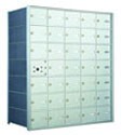 Metal locker cabinet with multiple compartments and one open door.