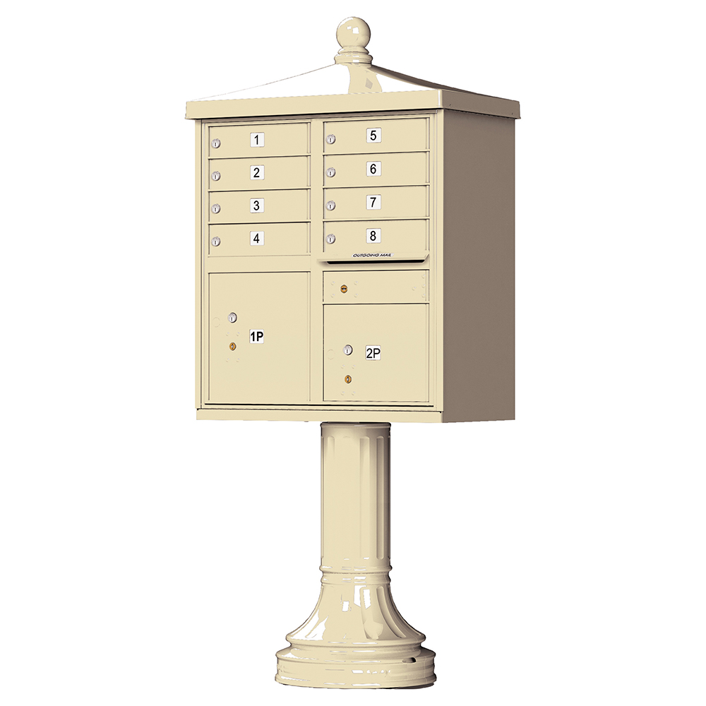 Beige pedestal mailbox with multiple compartments and numbered doors.