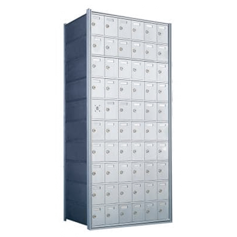Tall metal mailbox unit with multiple locked compartments in a grid pattern.