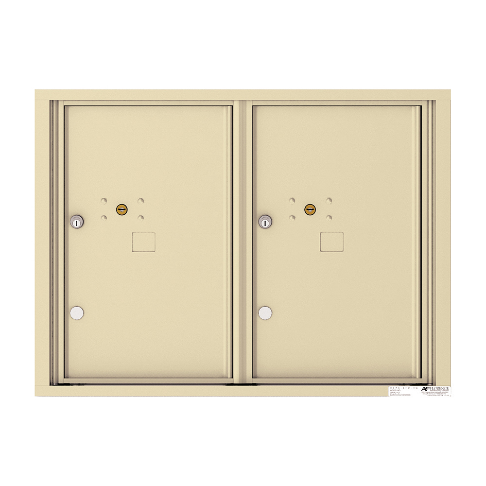 Beige double-door metal mailbox with locks and keyholes.