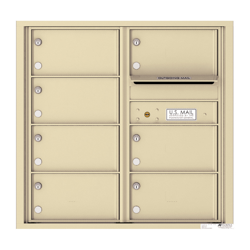 Beige wall-mounted cluster mailbox with multiple compartments and outgoing mail slot.
