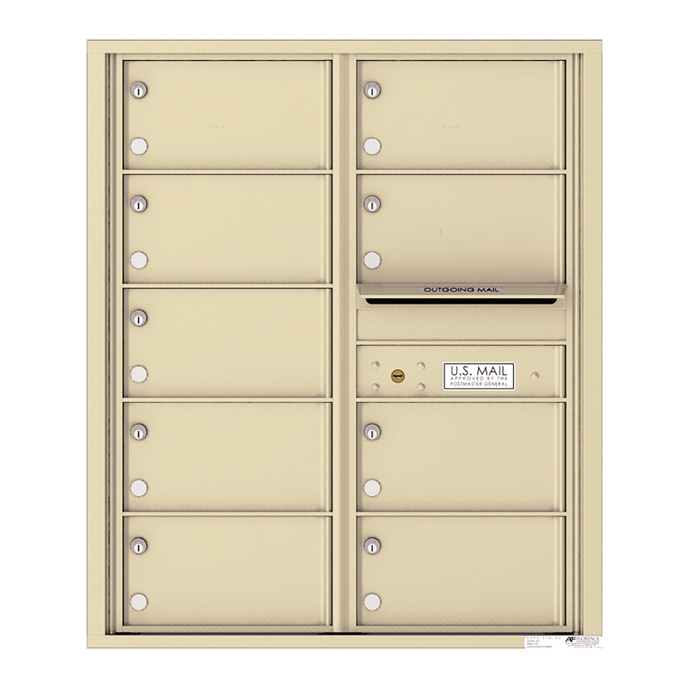 Beige wall-mounted USPS mailbox unit with multiple compartments and an outgoing mail slot.