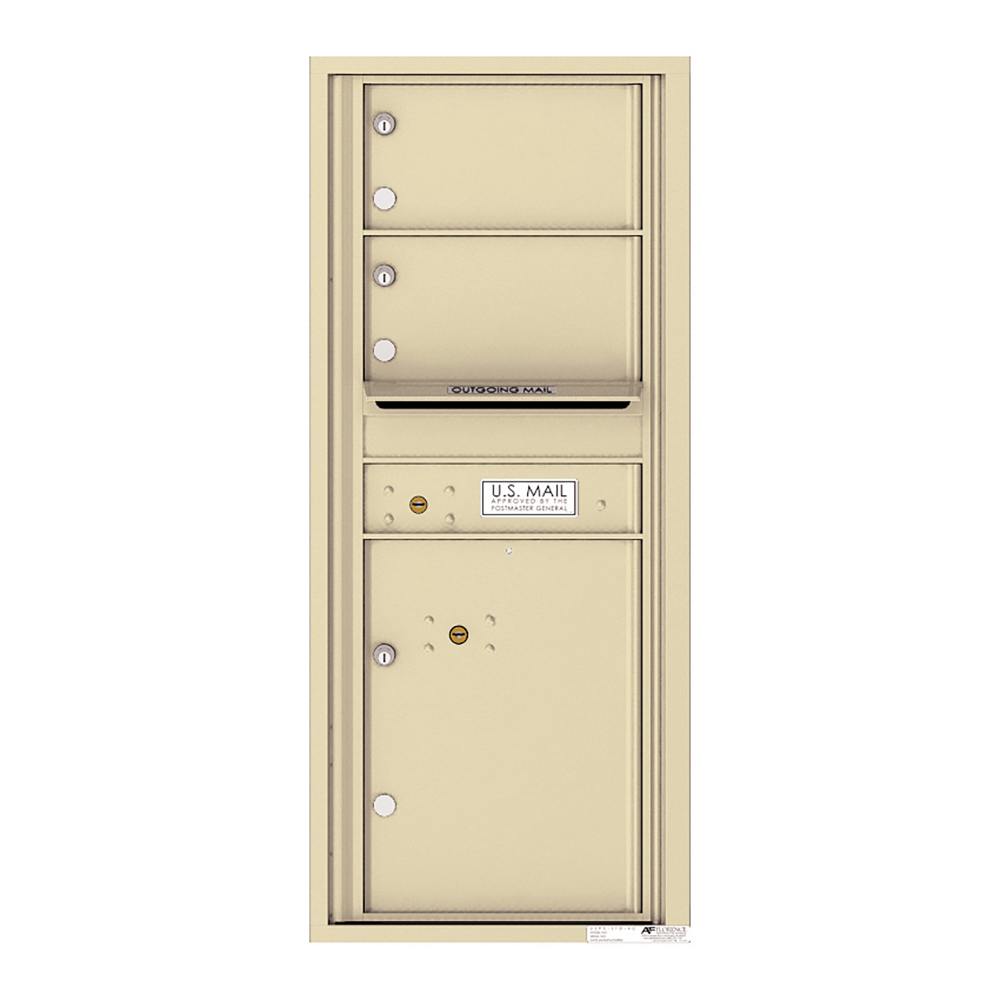 Beige wall-mounted mailbox unit with multiple compartments and U.S. Mail label.