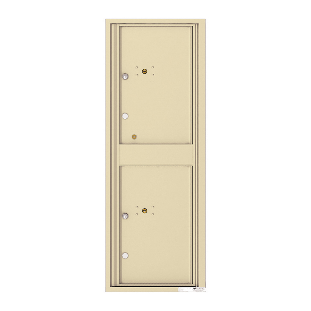 Beige metal mailbox with two compartments and keyholes.