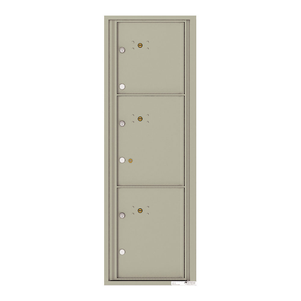 Vertical beige metal mailbox unit with three compartments and keyholes.