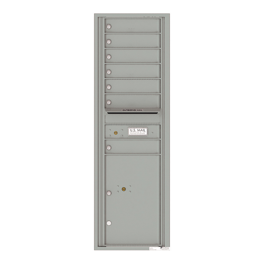 Gray multi-unit mailbox with seven compartments and an outgoing mail slot.