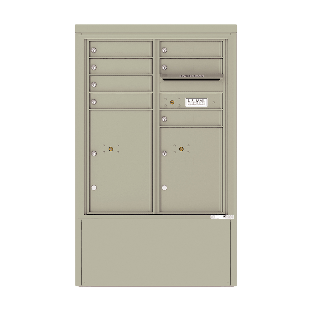 Tan metal cluster mailbox with multiple compartments and a U.S. Mail label.