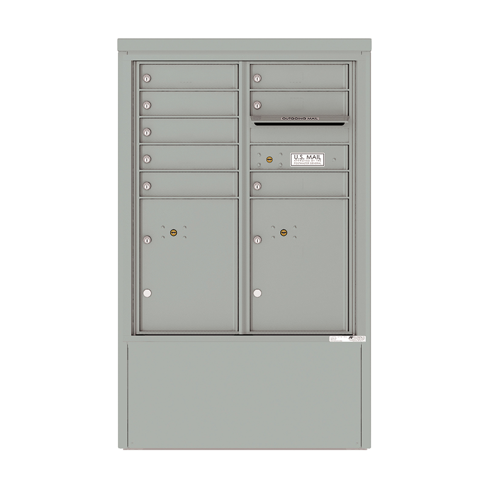Gray metal cluster mailbox with multiple compartments and an outgoing mail slot.