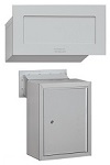 Gray wall-mounted mailbox with a rectangular design and secure lock.