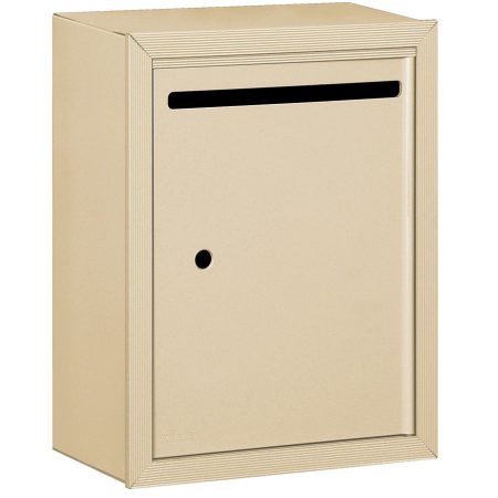 Beige wall-mounted mailbox with a mail slot and keyhole.